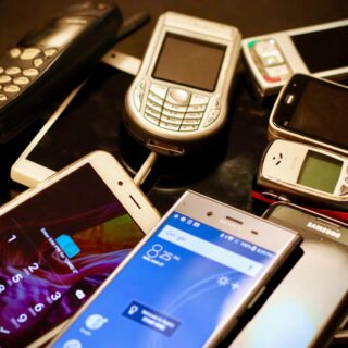 Pile of assorted phones.