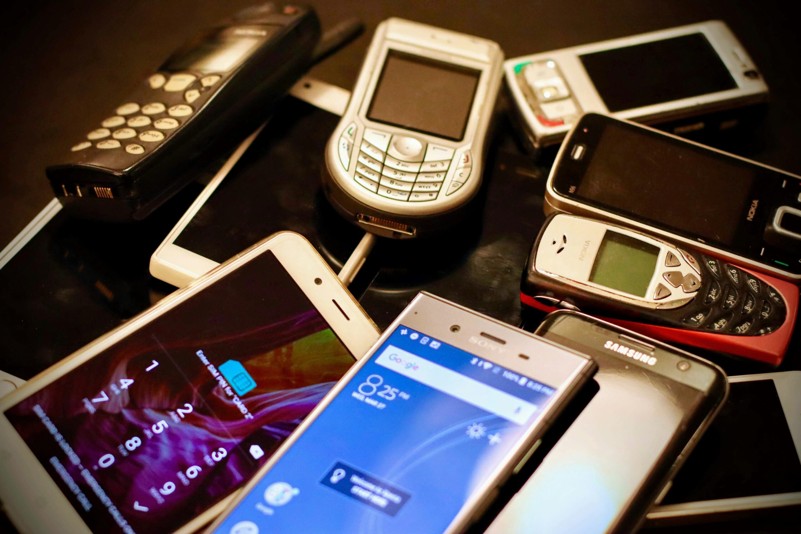 Pile of assorted phones.